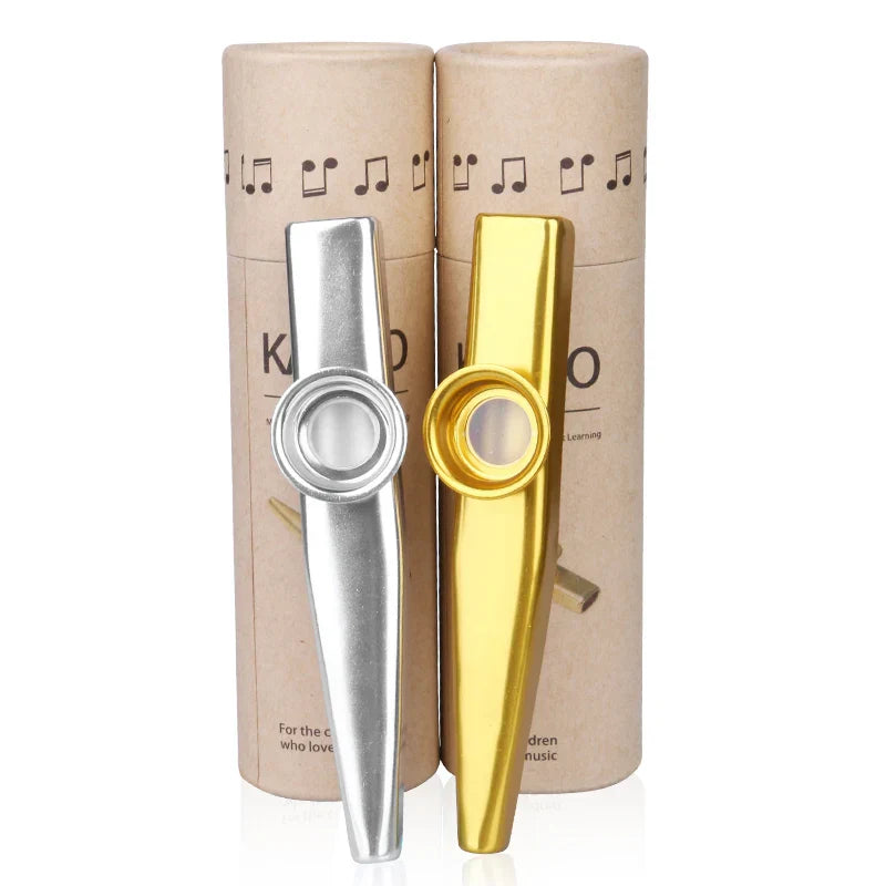 Two metal kazoo musical instruments in silver and gold with circular mouthpieces from a 5 pcs flute film set to learn musical instruments