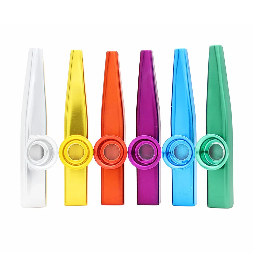 A set of six colorful metal kazoos simple design in white yellow orange purple blue and green for beginner guitar ukulele violin instrument players
