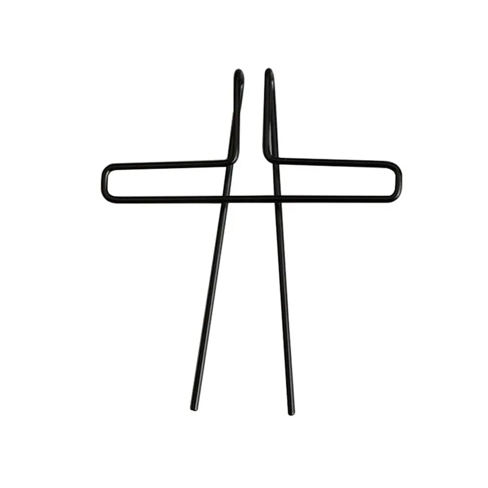 Black metal music book clip with a minimalist cross design metal page holder for pianos cooking recipe magazines