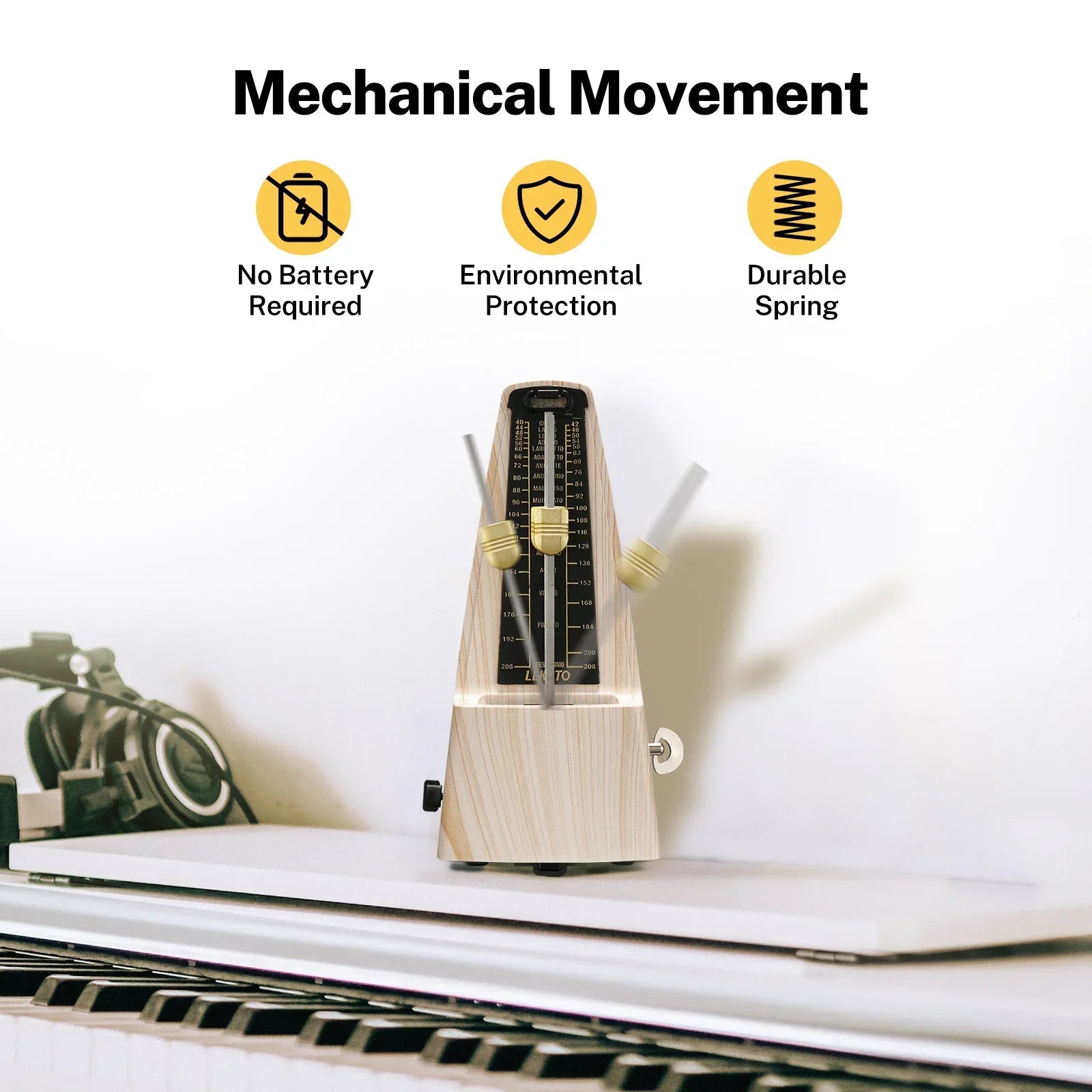 A mechanical metronome accurate for beginners made of ash wood grain with a black and gold face and brass knobs to track beat tempo