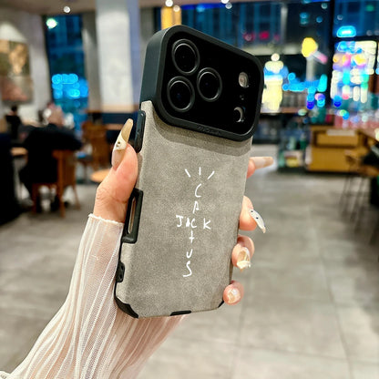 Back side of gray microfiber leather phone case with black camera cutout and cactus jack branding for cover 16e luxury music jack cases