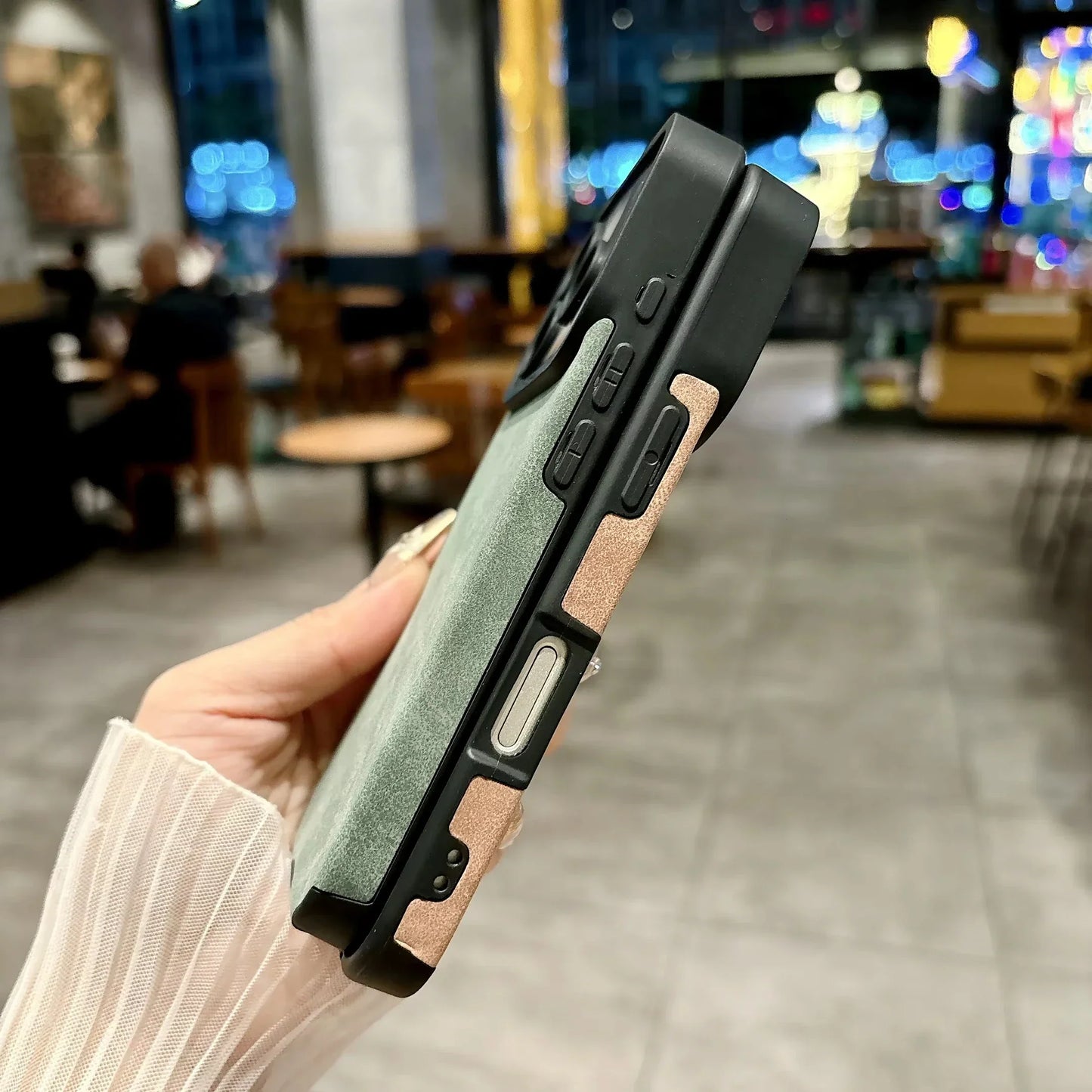 Back view of a sleek two-tone microfiber leather phone case with matte sage green and rose gold cover 16e luxury music jack case
