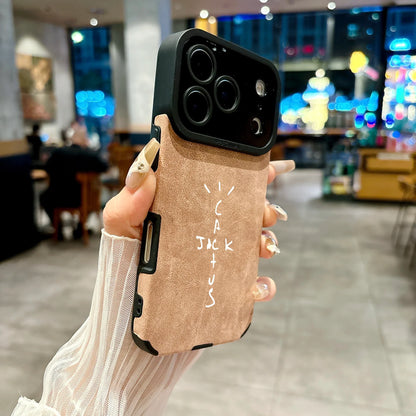 Tan suede-textured microfiber leather phone case back with black camera bump and white jackson lettering for cover 16e luxury