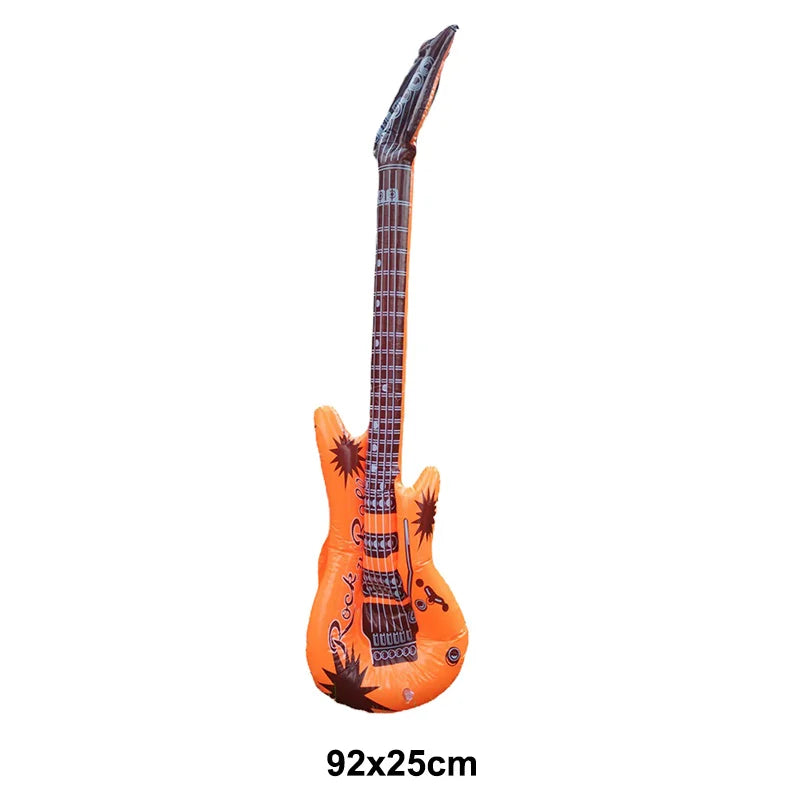 Orange inflatable electric guitar with black starburst decals and faux metal hardware for microphone balloons karaoke and 80s 90s party boy rapper hip hop decor