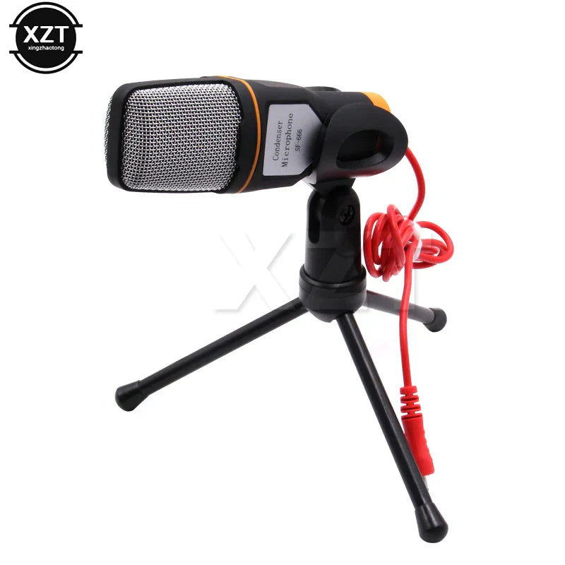 Black and orange condenser microphone with silver mesh grille on tripod stand for professional sound podcast studio use