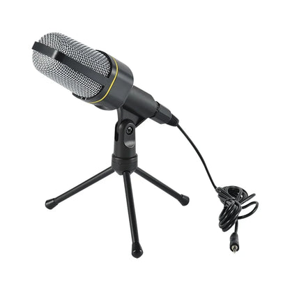 Black and silver jack recording condenser microphone with mesh grille mounted on mini tripod mount for laptop singing and gaming