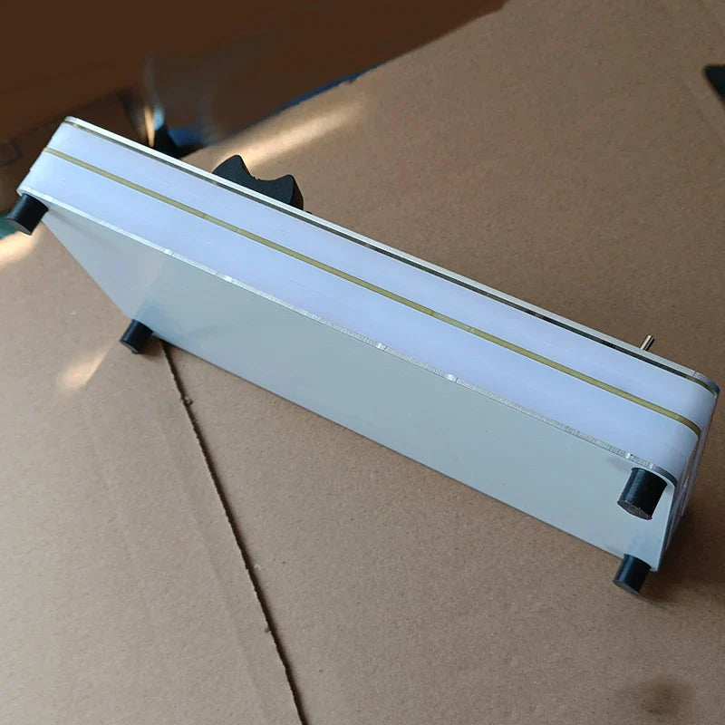 White rectangular midi cc controller with metallic edge and black feet featuring 100mm sliding fader usb for computer music hosting