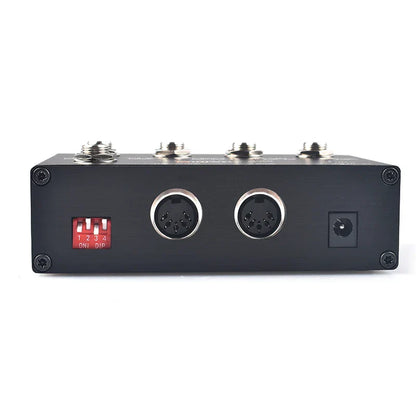 Black rectangular midi thru to trs box with two silver jacks and five-pin din interface to trs interface convert inputs