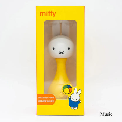 Yellow miffy-themed shake and learn rattle with white round head and black dot eyes for cartoon figures home decor accessories