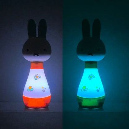 A soft-glowing miffy cartoon figures home night light in white and orange with floral and musical note home decor accessories