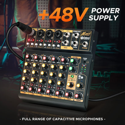 Black debra mini mix 6-channel audio mixer with gold accents and illuminated knobs featuring power supply and wide frequency response range