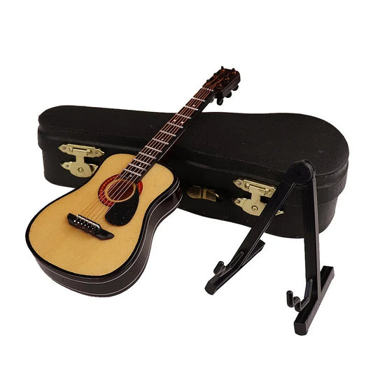 Mini classical guitar with light wood finish and black binding on matching black case, ideal guitar decoration gift