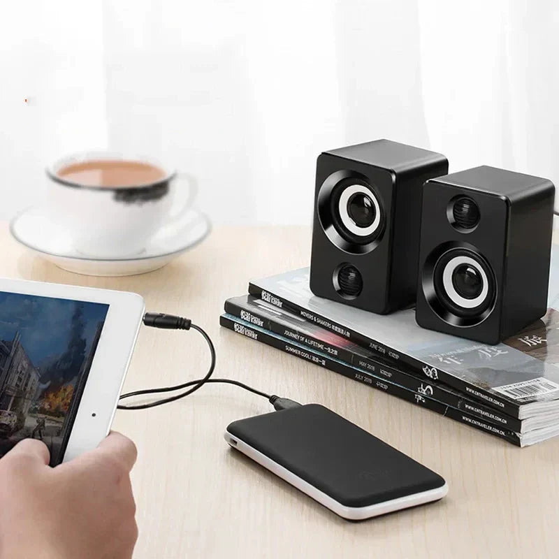 Black cube-shaped mini computer speaker with white drivers and matte finish computer speaker usb sound surround portable