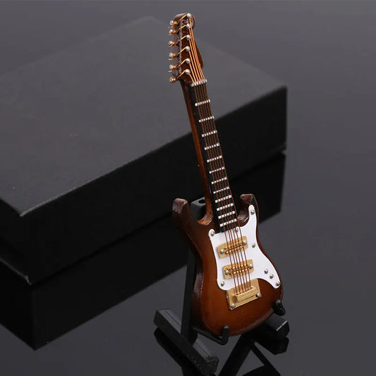 Mini electric guitar model decoration features brown body white pickguard gold hardware on black stand for type beat music