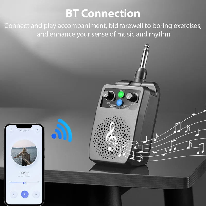 Compact black jdyc ub-pro mini electric guitar speaker with silver antenna and control knobs for portable practice amp