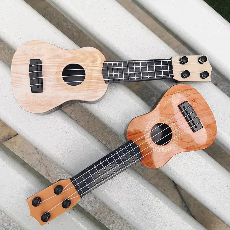 Two mini guitars 4 strings classical ukulele toy for kids children beginners with natural and ornate wood finish designs