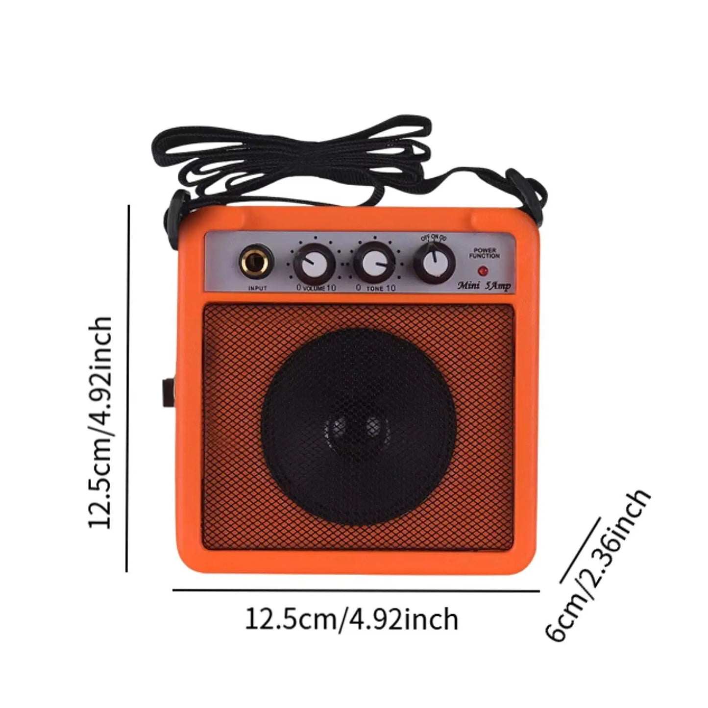 Orange mini guitar amplifier 5w small speaker with black mesh grille and volume control from beat music store