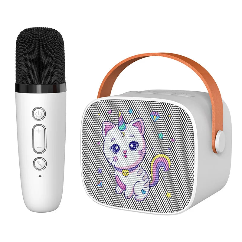 White kids portable speaker with cartoon unicorn design and orange handle for mini karaoke machine with wireless microphone