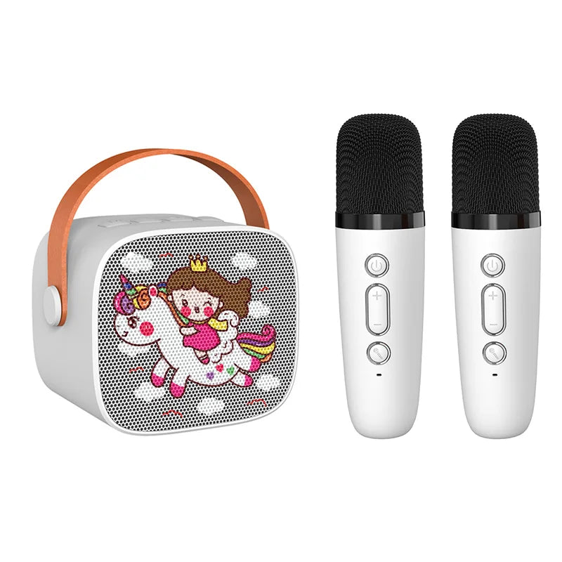 White kids portable speaker with orange handle featuring cartoon unicorn design mini karaoke machine with wireless microphone