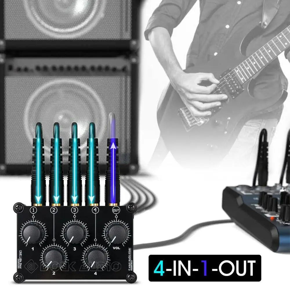 Black mini mc5 portable 4 channel audio mixer with teal input jacks and purple output jack for live studio console use