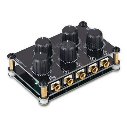 Black mini mc5 portable 4 channel audio mixer with six knobs and gold rca jacks for live studio console use