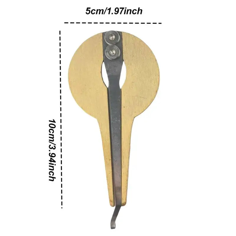 Mini metal jaw harp with wooden body, dark metal reed, and silver screws, beginner friendly mouth music instrument