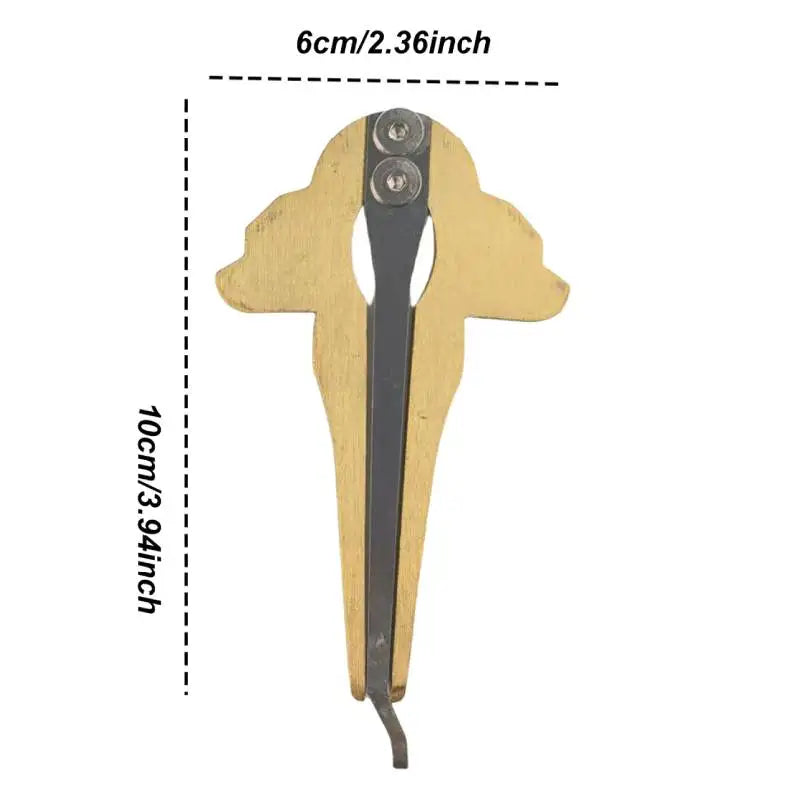 Golden-brown wooden dog-shaped hair clip with black hinge and silver screws for jaw harp beginner mouth music instrument