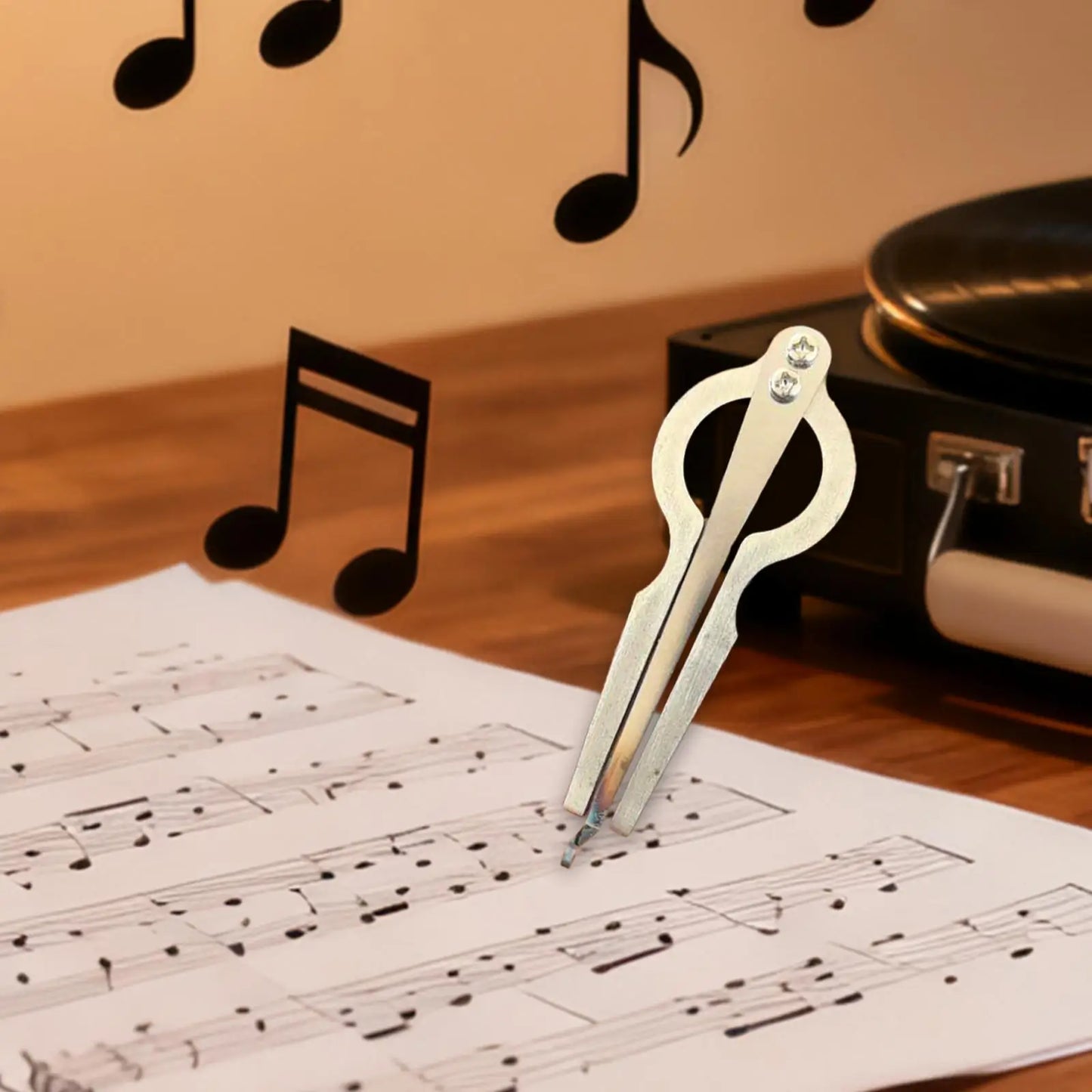 A sleek silver-toned metal jaw harp beginner friendly mouth music instrument with polished finish and decorative gemstones