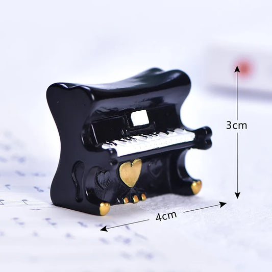 Black miniature musical instruments piano figurine with gold accents and heart details for house decor accessory