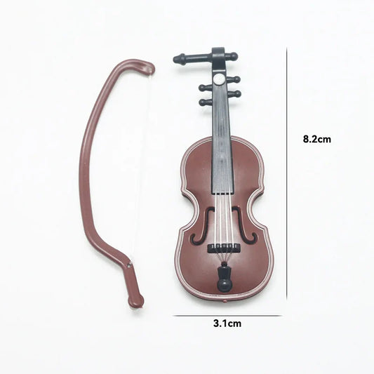 Brown plastic violin-shaped miniature musical instrument keychain with black accents and silver strings for decor accessory