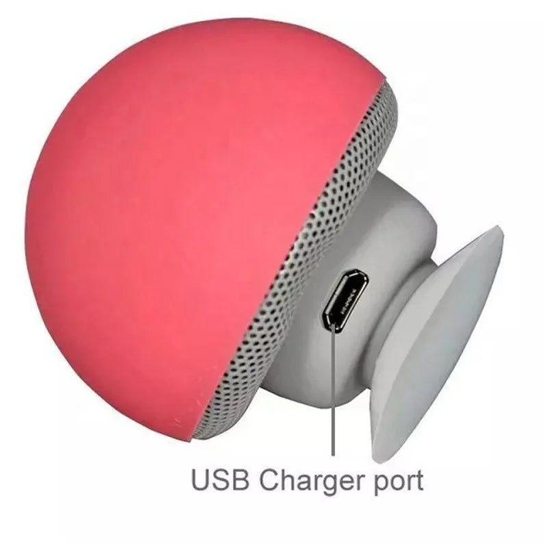 Pink mini mushroom wireless bluetooth speaker with gray grille and white popsocket base mic portable waterproof shower stereo subwoofer