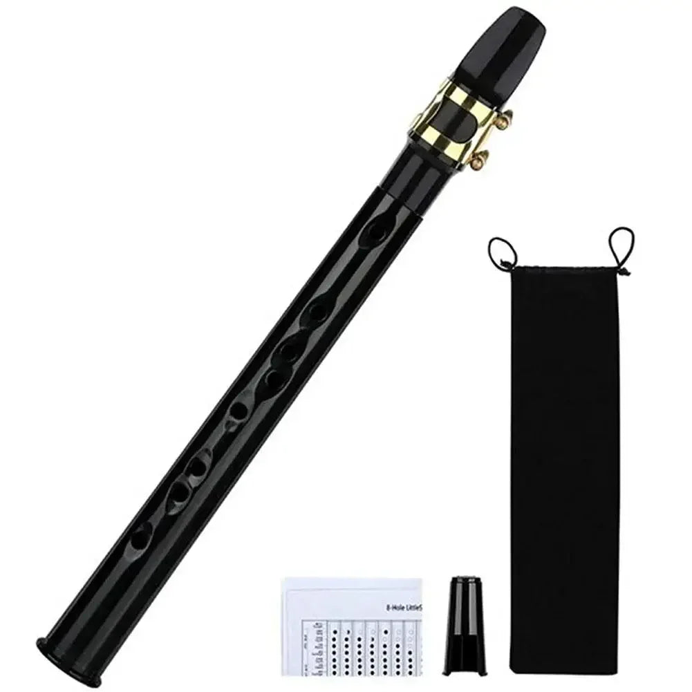 Black plastic b-flat recorder with gold keys and mouthpiece as a mini pocket saxophone c key woodwind musical instrument