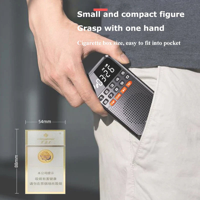 Compact black and orange mini portable pocket radio receiver with digital display, keypad, radio dual antenna, and speaker TF card