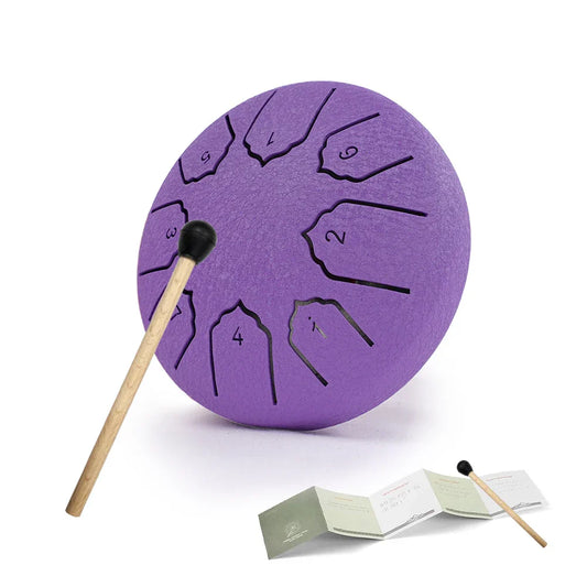 Purple steel tongue drum with black numbered notes rain drum playing sections and wooden mallet for outdoor use