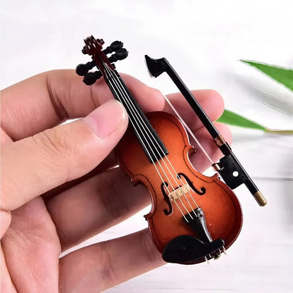 Mini violin model with warm amber-brown finish and black accents on stand basswood wooden for musicians music lovers display
