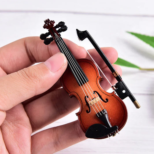 Miniature music instrument plastic mini violin ornament with warm brown finish and matching black bow for home decoration
