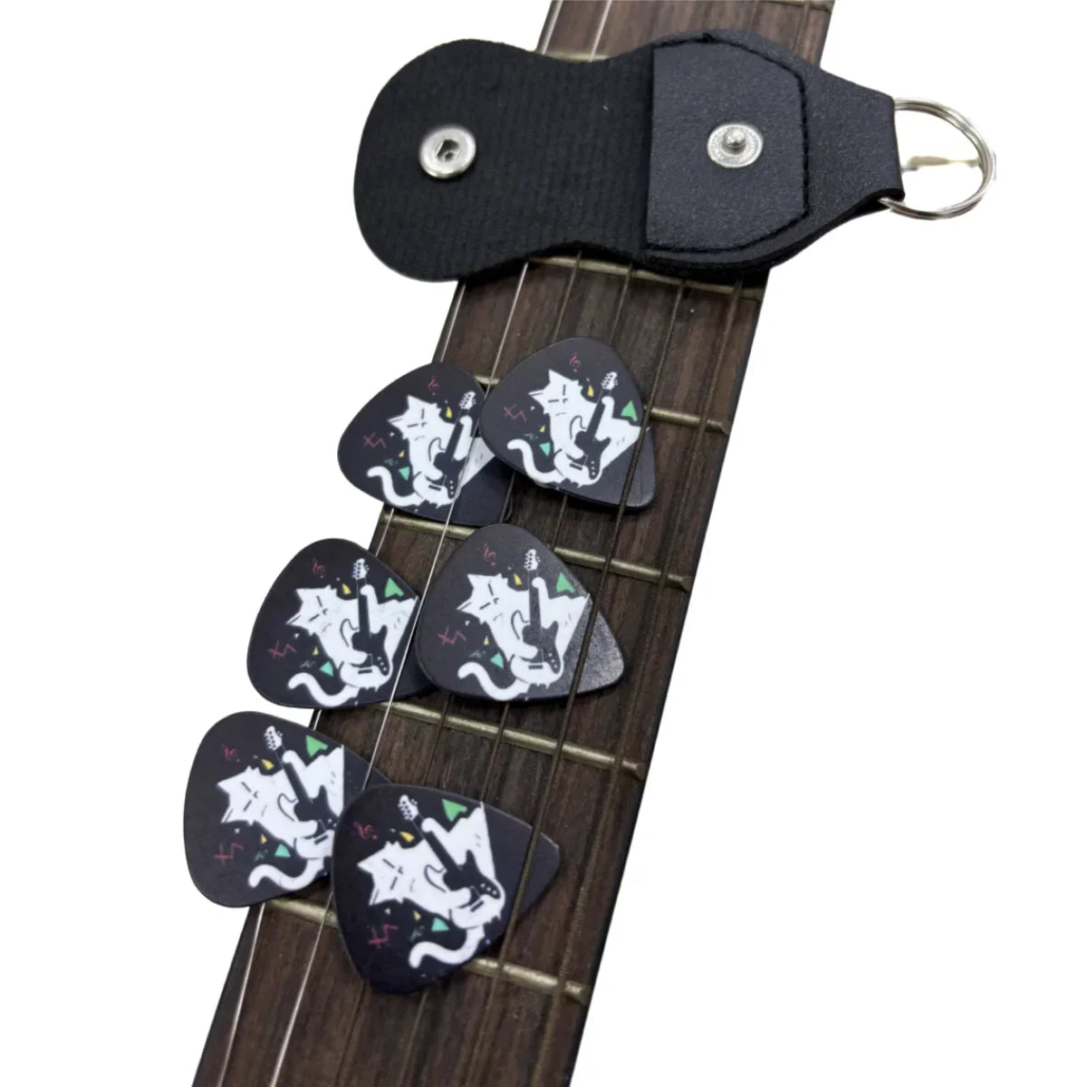 Black guitar picks featuring white cat and electric guitar designs in a leather keychain holster for original sound guitar use
