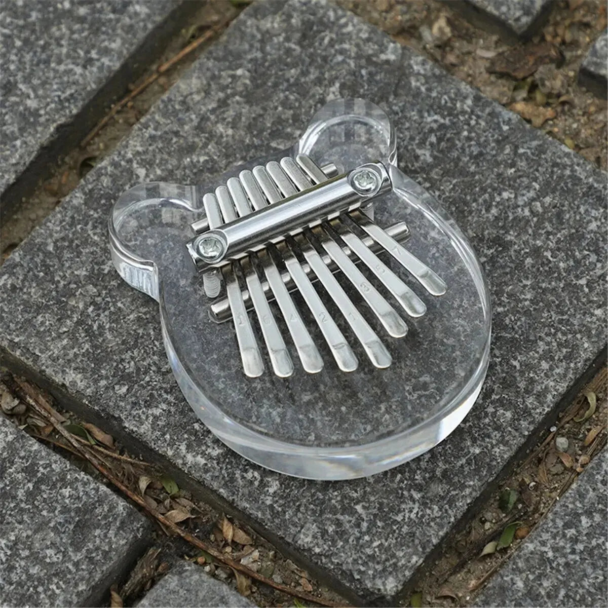 Clear acrylic bear-shaped mini kalimba rainbow with silver metal tines and tuning screws acrylic thumb piano