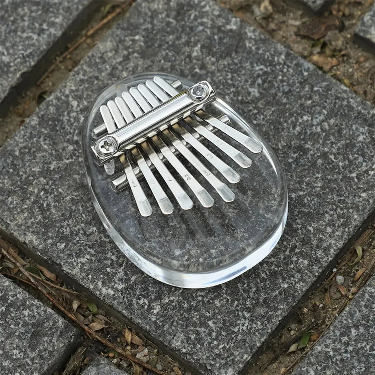 Transparent acrylic mini kalimba rainbow with silver metal tines and tuning screws for acoustic finger piano play