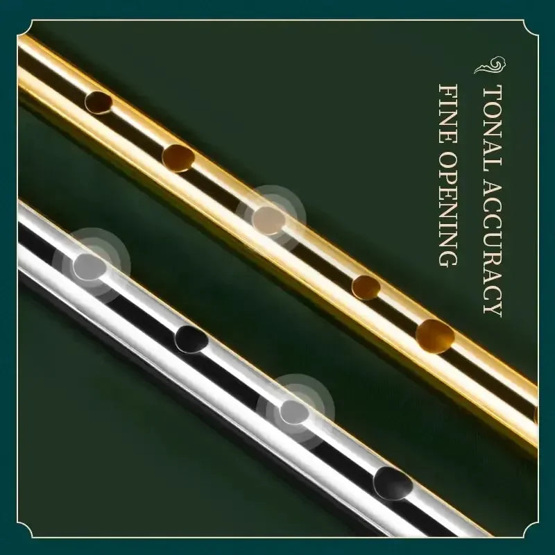 Two metallic authentic irish whistle flutes in gold and silver with black stripe and six holes for traditional irish music