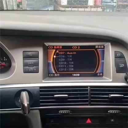 Silver-framed car infotainment screen displaying cd player menu in chinese with mmi 2g bluetooth music adapter for audi a6l