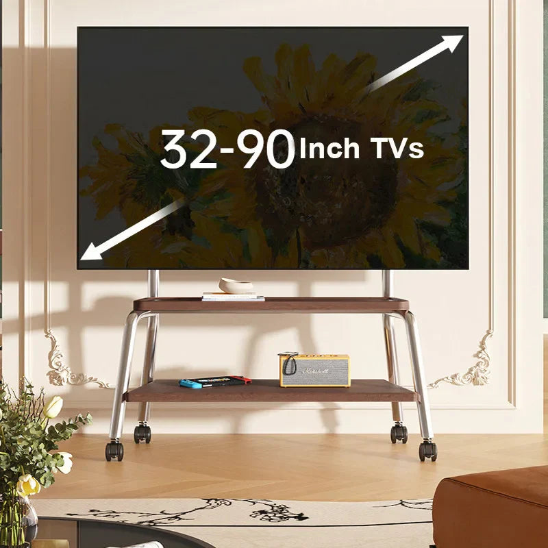 A mobile tv stand with height adjustable heavy-duty silver metal legs, dark wood top, and double wooden shelf with caster wheels