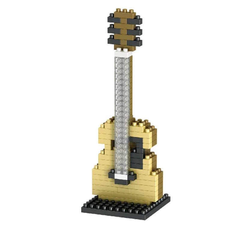 Gold acoustic guitar made from tiny interlocking abs plastic bricks for musical instrument building diy assembly toys