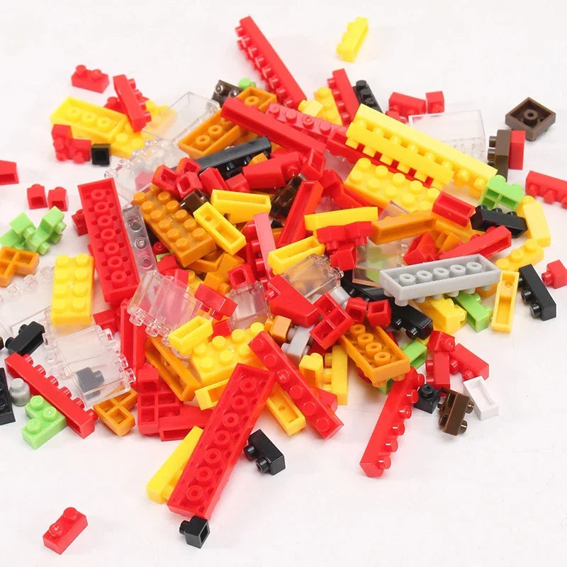 A colorful assortment of abs plastic lego bricks in red yellow black green orange gray and transparent for musical instrument building and guitar diy assembly