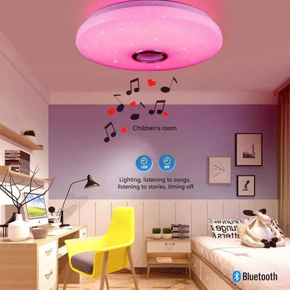 Pink circular modern ceiling lamp with star-like led lights and central speaker grille bluetooth music light