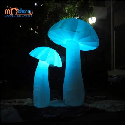 Two glowing blue giant inflatable mushroom balloons with rgb led lights made of oxford cloth for advertising and festivals