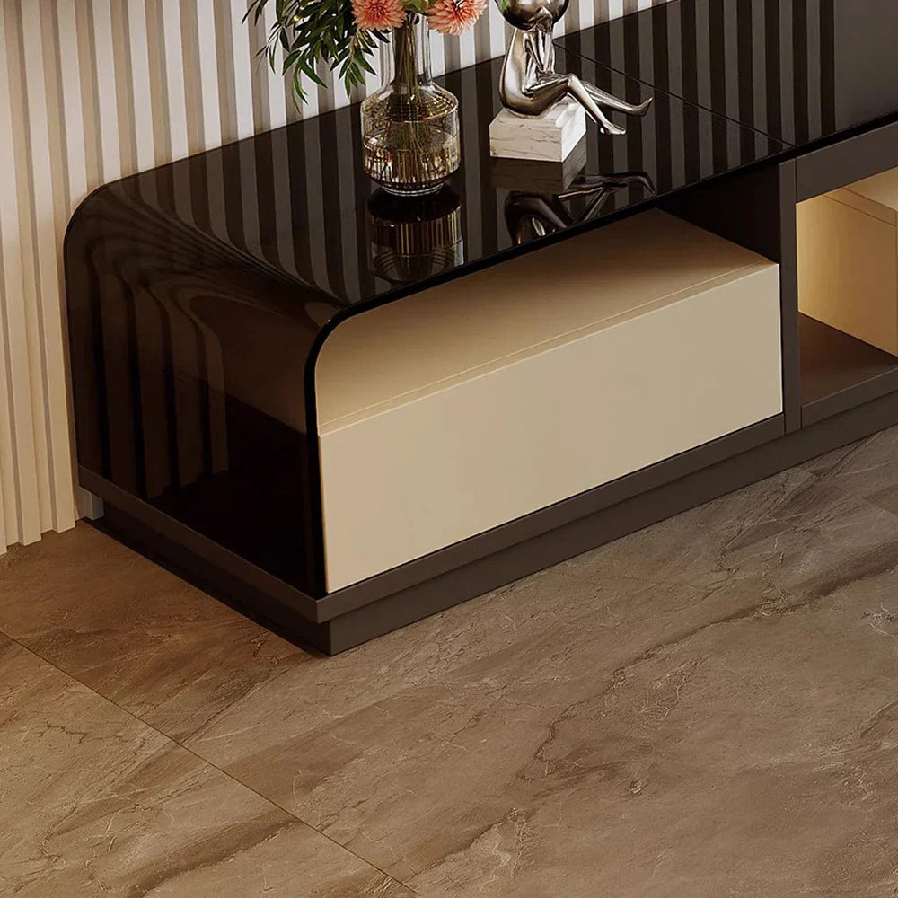 Modern luxury tv stand with black and beige glass top and curved front edge media console table for living room