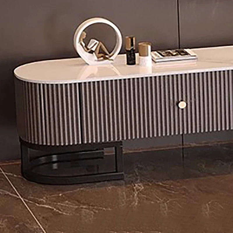 Modern minimalist tv stand with white marble top, gray ribbed metal sides, black base, and modern metal handles