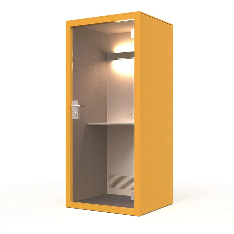 Bright yellow metal pod portable studio with glass door and interior shelving for soundproof single person office use