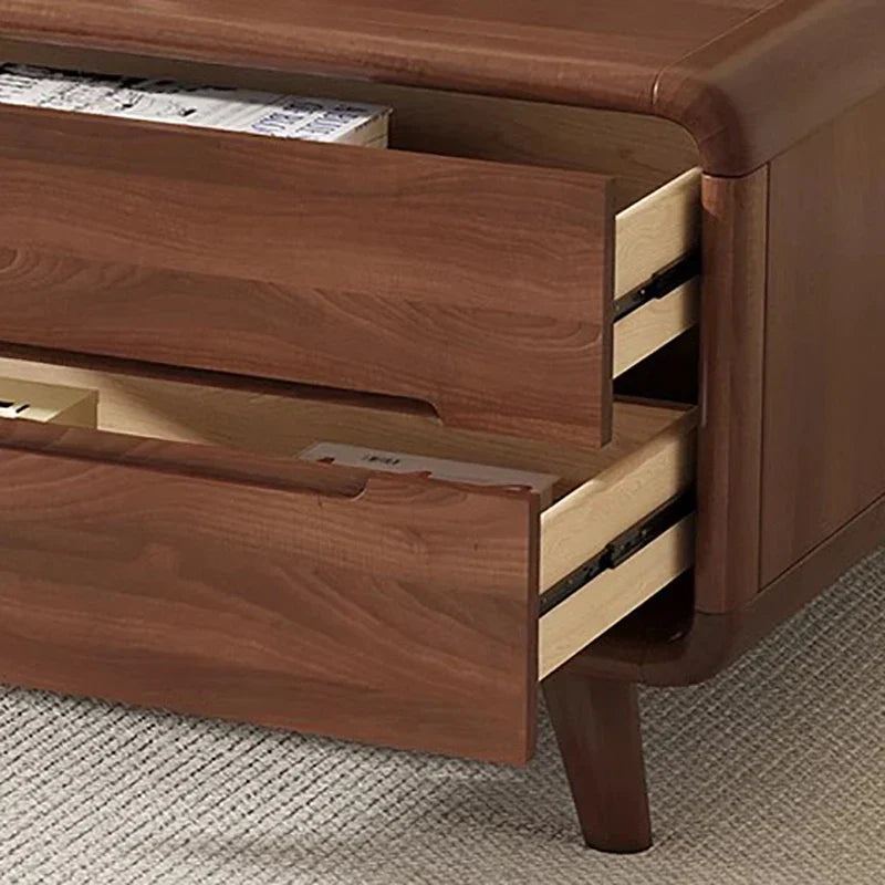 A warm brown wooden tv cabinet with sleek curved drawers and tapered legs for moderno living room decor luxury nordic